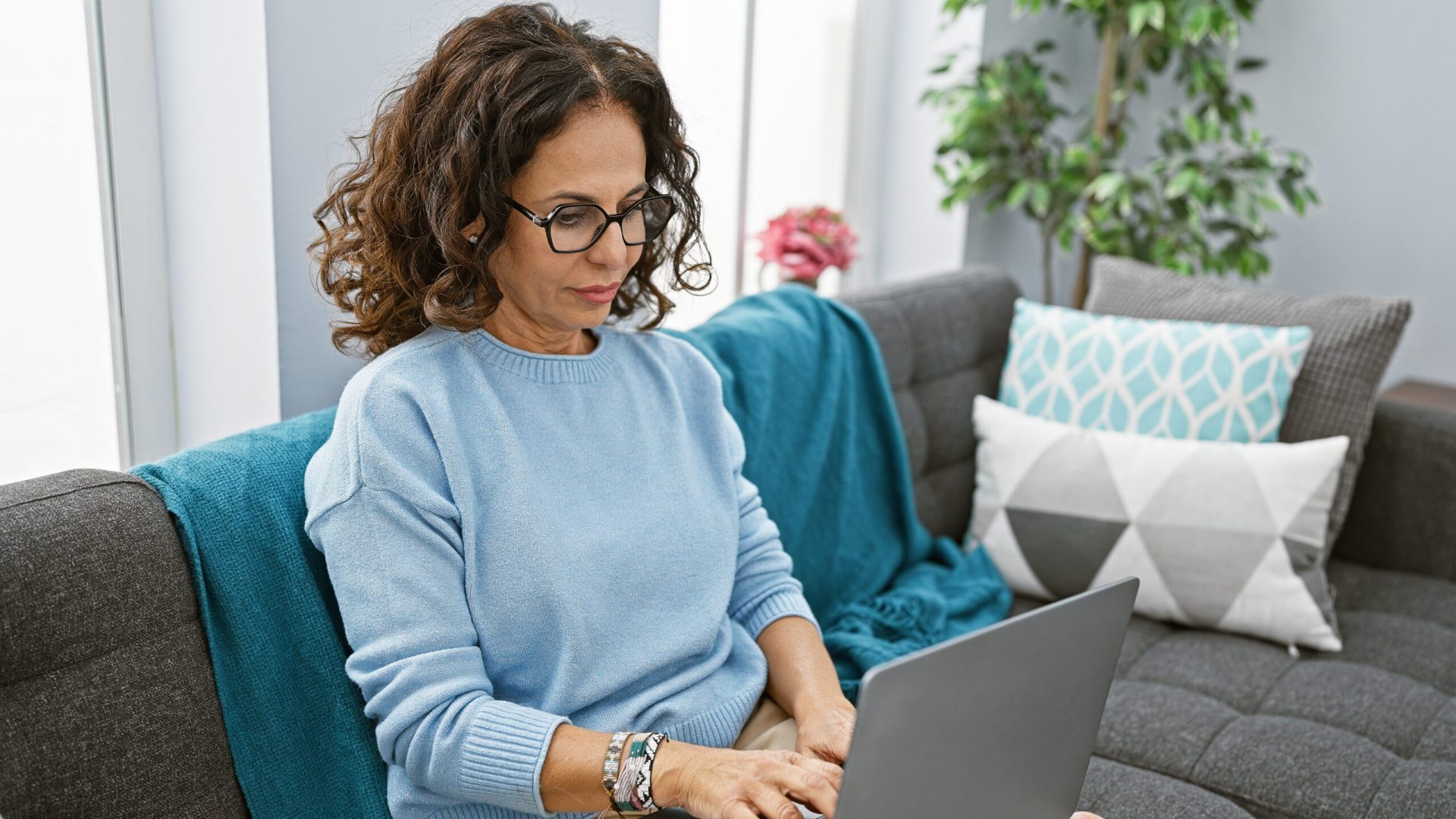 Property upsizer exploring Funding's fast and flexible bridging finance products on a laptop
